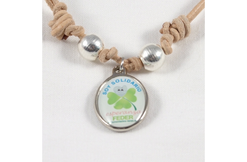 Colgante solidario de Pimpoyos.com a favor de FEDER