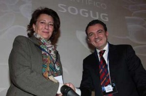 Isabel Oriol, presidenta de la AECC, y Dr. Daniel Castellano, presidente del SOGUG